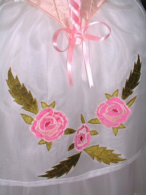 close-up of the flower-applique apron on the La Fille mal gardee costume.