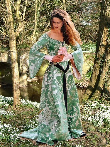 design for forest green medieval style wedding dress with hanging sleeves and contrasting embroidered panels