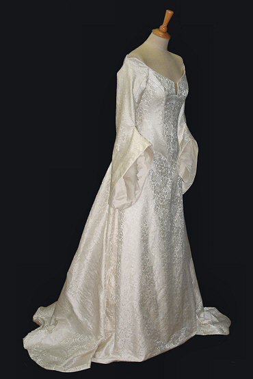 ivory brocade medieval style wedding dress with tailored hanging sleeves