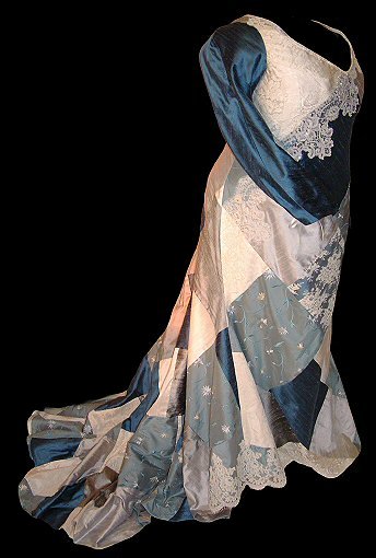soft grey-blue and ivory silk corseted gownwith lace and beading embellishments