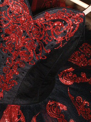 sparkling red embellished classical ballet tutu on blackground