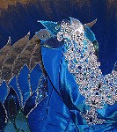 This tutu is inspired by one of the most famous pas de deux danced by Princess Florine and her Bluebird.  Its blue/green taffeta bodice with silver lace has dramatic appliqu wing decoration, highlighted with light reflecting beadwork.