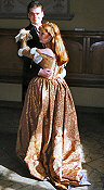 Renaissance inspired wedding gown with split sleeves in shot gold-purple silk