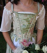 18th century style corset in brocade and silk with false fron lacing