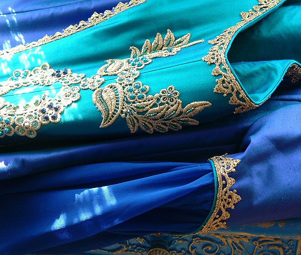  bodice of medieval style wedding dress with gold trimmings and contrasting panel