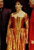 Jane Gurnett in gold and red tudor costume in Webster's The White Devil